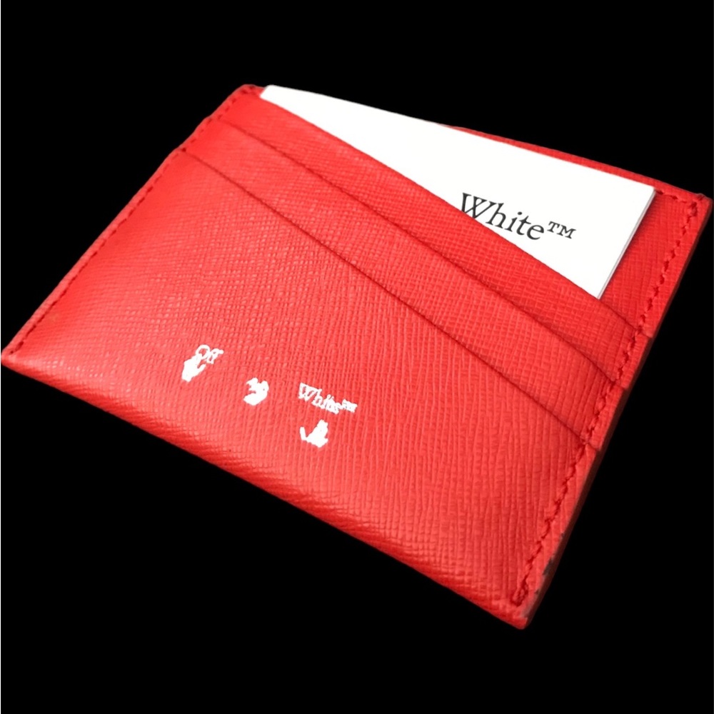 Off-white card holder in perfect condition.